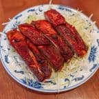 Best Barbecue Ribs (4 pieces) in Austin, TX